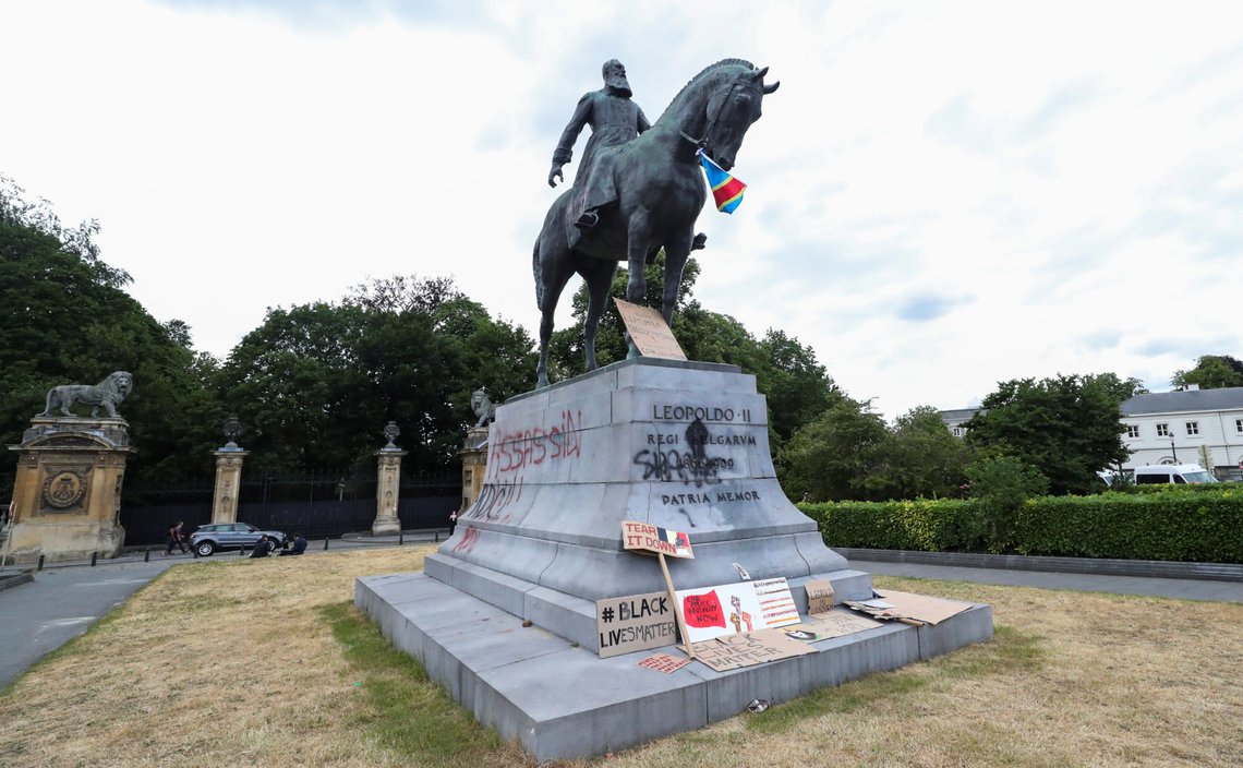 A statue of Leopold II sprayed with a graffiti is pictured during a protest, organised by Black Lives Matter Belgium, against racial inequality in the aftermath of the death in Minneapolis police custody of George Floyd, in central Brussels, Belgium June 7, 2020. REUTERS/Yves Herman A statue of Leopold II sprayed with a graffiti is pictured during a protest, organised by Black Lives Matter Belgium, against racial inequality in the aftermath of the death in Minneapolis police custody of George Floyd, in central Brussels, Belgium June 7, 2020. REUTERS/Yves Herman