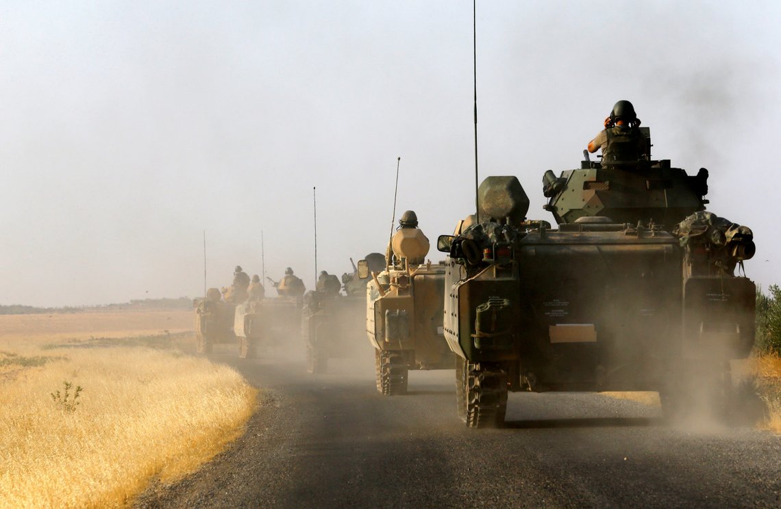 Turkish armoured personnel carriers drive towards the border in Karkamis on the Turkish-Syrian border in the southeastern Gaziantep province, Turkey, August 27, 2016. REUTERS/Umit Bektas/File Photo Turkish armoured personnel carriers drive towards the border in Karkamis on the Turkish-Syrian border in the southeastern Gaziantep province, Turkey, August 27, 2016. REUTERS/Umit Bektas/File Photo