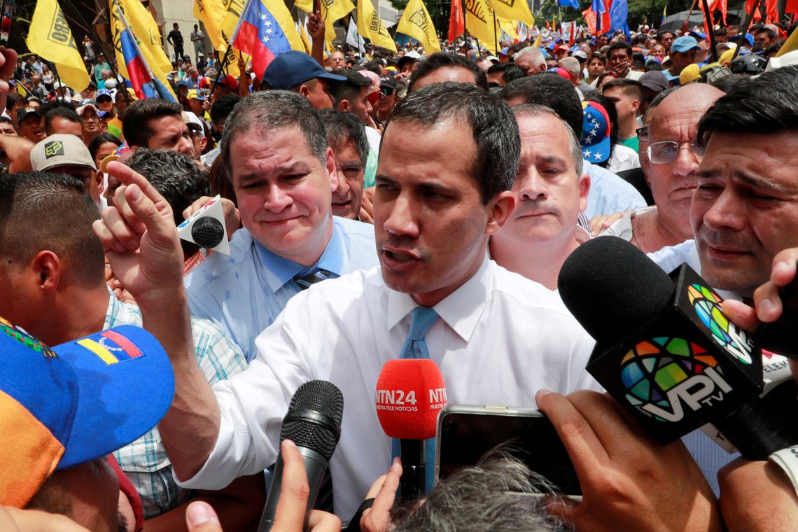 FILE PHOTO: Venezuelan opposition leader Juan Guaido, who many nations have recognised as the country's rightful interim ruler, speaks to the media as he takes part in a demonstration in Caracas, Venezuela, March 10, 2020. REUTERS/Carlos Jasso/File Photo FILE PHOTO: Venezuelan opposition leader Juan Guaido, who many nations have recognised as the country's rightful interim ruler, speaks to the media as he takes part in a demonstration in Caracas, Venezuela, March 10, 2020. REUTERS/Carlos Jasso/File Photo