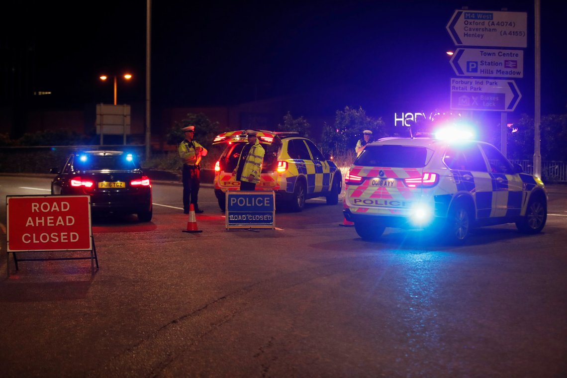 Police vehicles close off a road at the scene of reported multiple stabbings in Reading, Britain, June 20, 2020. REUTERS/Peter Cziborra Police vehicles close off a road at the scene of reported multiple stabbings in Reading, Britain, June 20, 2020. REUTERS/Peter Cziborra