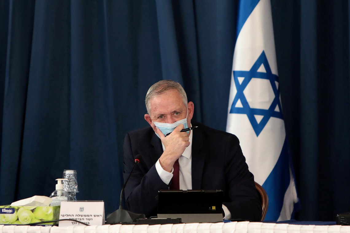 Israeli Defense Minister Benny Gantz wears a protective mask, amid the spread of the coronavirus disease (COVID-19), as he attends a weekly cabinet meeting at the Foreign Ministry in Jerusalem, July 5, 2020. Gali Tibbon/Pool via REUTERS Israeli Defense Minister Benny Gantz wears a protective mask, amid the spread of the coronavirus disease (COVID-19), as he attends a weekly cabinet meeting at the Foreign Ministry in Jerusalem, July 5, 2020. Gali Tibbon/Pool via REUTERS