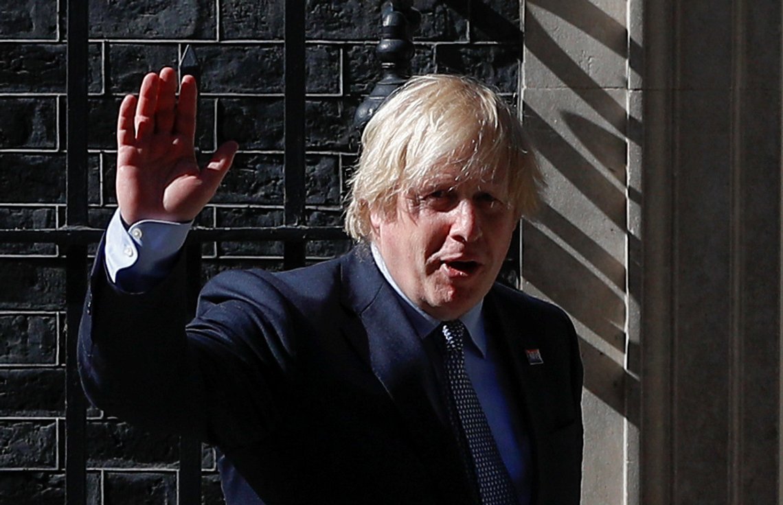 Britain's Prime Minister Boris Johnson waves outside 10 Downing Street after an applause on the occasion of the 72nd anniversary of the NHS, amid the coronavirus disease (COVID-19) outbreak, in London, Britain, July 5, 2020. REUTERS/Peter Nicholls Britain's Prime Minister Boris Johnson waves outside 10 Downing Street after an applause on the occasion of the 72nd anniversary of the NHS, amid the coronavirus disease (COVID-19) outbreak, in London, Britain, July 5, 2020. REUTERS/Peter Nicholls