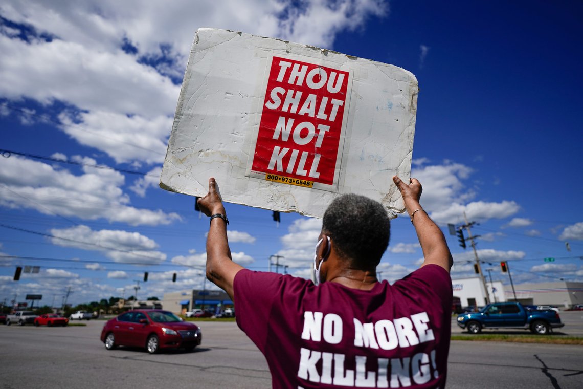 Reverend Sylvester Edwards, President of the Terre Haute NAACP, stands near the Federal Correctional Institution, Terre Haute, to express his opposition to the death penalty and execution of Daniel Lewis Lee, who is convicted in the killing of three members of an Arkansas family in 1996, and would be the first federal execution in 17 years, in Terre Haute, Indiana, U.S. July 13, 2020. REUTERS/Bryan Woolston Reverend Sylvester Edwards, President of the Terre Haute NAACP, stands near the Federal Correctional Institution, Terre Haute, to express his opposition to the death penalty and execution of Daniel Lewis Lee, who is convicted in the killing of three members of an Arkansas family in 1996, and would be the first federal execution in 17 years, in Terre Haute, Indiana, U.S. July 13, 2020. REUTERS/Bryan Woolston