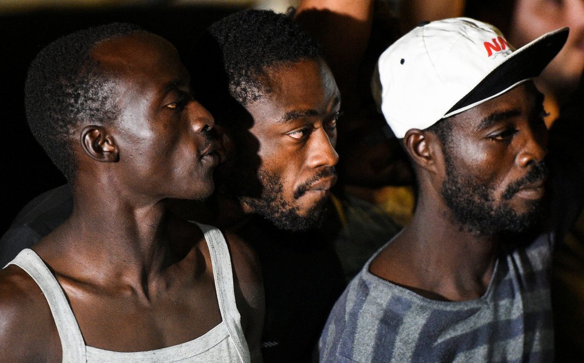 Spanish rescue ship Open Arms with migrants on board arrives in Lampedusa, Italy, August 20, 2019. REUTERS/Guglielmo Mangiapane Spanish rescue ship Open Arms with migrants on board arrives in Lampedusa, Italy, August 20, 2019. REUTERS/Guglielmo Mangiapane