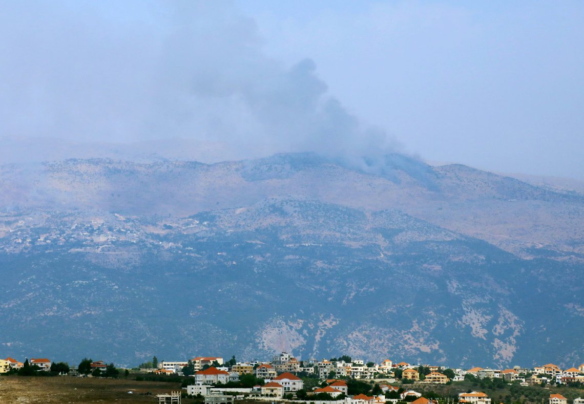 Smoke rises from the disputed Shebaa Farms area as seen from Marjayoun village in southern Lebanon, Lebanon July 27, 2020. REUTERS/Karamallah Daher Smoke rises from the disputed Shebaa Farms area as seen from Marjayoun village in southern Lebanon, Lebanon July 27, 2020. REUTERS/Karamallah Daher