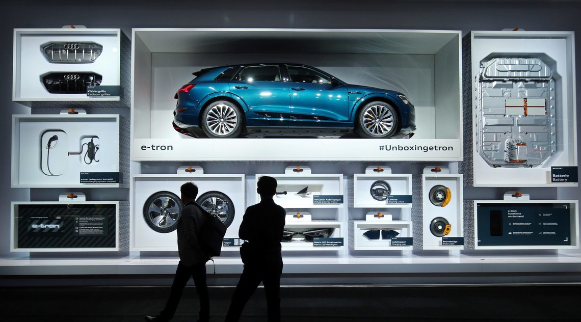 People check Audi e-tron inside a large box display at the 2019 Frankfurt Motor Show (IAA) in Frankfurt, Germany, September 10, 2019. REUTERS/Ralph Orlowski People check Audi e-tron inside a large box display at the 2019 Frankfurt Motor Show (IAA) in Frankfurt, Germany, September 10, 2019. REUTERS/Ralph Orlowski