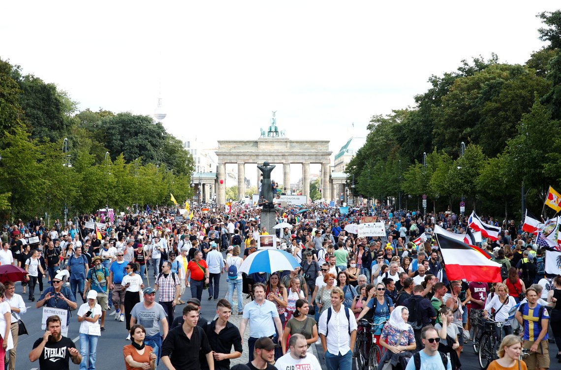 Demonstrators attend a rally against the government's restrictions following the coronavirus disease (COVID-19) outbreak, in Berlin, Germany August 29, 2020. REUTERS/Axel Schmidt Demonstrators attend a rally against the government's restrictions following the coronavirus disease (COVID-19) outbreak, in Berlin, Germany August 29, 2020. REUTERS/Axel Schmidt