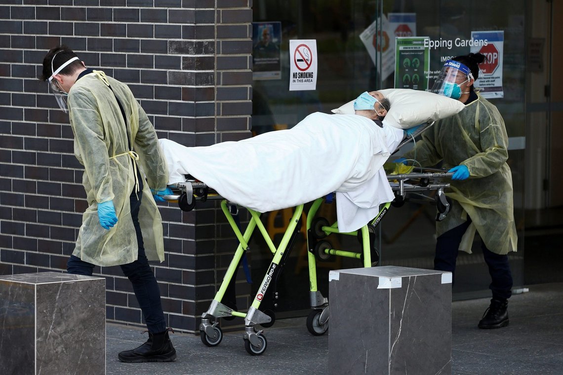 A resident is taken to an ambulance from an aged care facility experiencing an outbreak of the coronavirus disease (COVID-19) in Melbourne, Australia, July 28, 2020. AAP Image/Daniel Pockett via REUTERS ATTENTION EDITORS - THIS IMAGE WAS PROVIDED BY A THIRD PARTY. NO RESALES. NO ARCHIVE. AUSTRALIA OUT. NEW ZEALAND OUT A resident is taken to an ambulance from an aged care facility experiencing an outbreak of the coronavirus disease (COVID-19) in Melbourne, Australia, July 28, 2020. AAP Image/Daniel Pockett via REUTERS ATTENTION EDITORS - THIS IMAGE WAS PROVIDED BY A THIRD PARTY. NO RESALES. NO ARCHIVE. AUSTRALIA OUT. NEW ZEALAND OUT