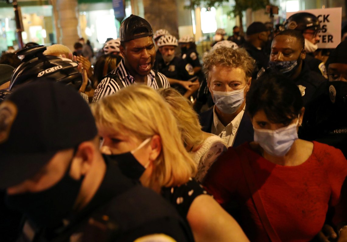 U.S. Senator Rand Paul (R-KY) is confronted by demonstrators during a protest in Washington, U.S. early August 28, 2020. REUTERS/Leah Millis U.S. Senator Rand Paul (R-KY) is confronted by demonstrators during a protest in Washington, U.S. early August 28, 2020. REUTERS/Leah Millis