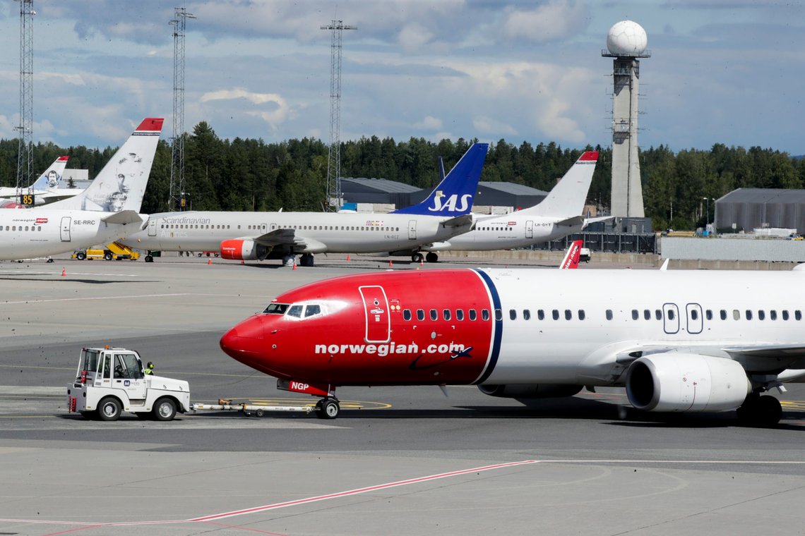 Gardermoen 20200709.
Norwegian og SAS fly ved Gardermoen.
Foto: Vidar Ruud / NTB scanpix Gardermoen 20200709.
Norwegian og SAS fly ved Gardermoen.
Foto: Vidar Ruud / NTB scanpix