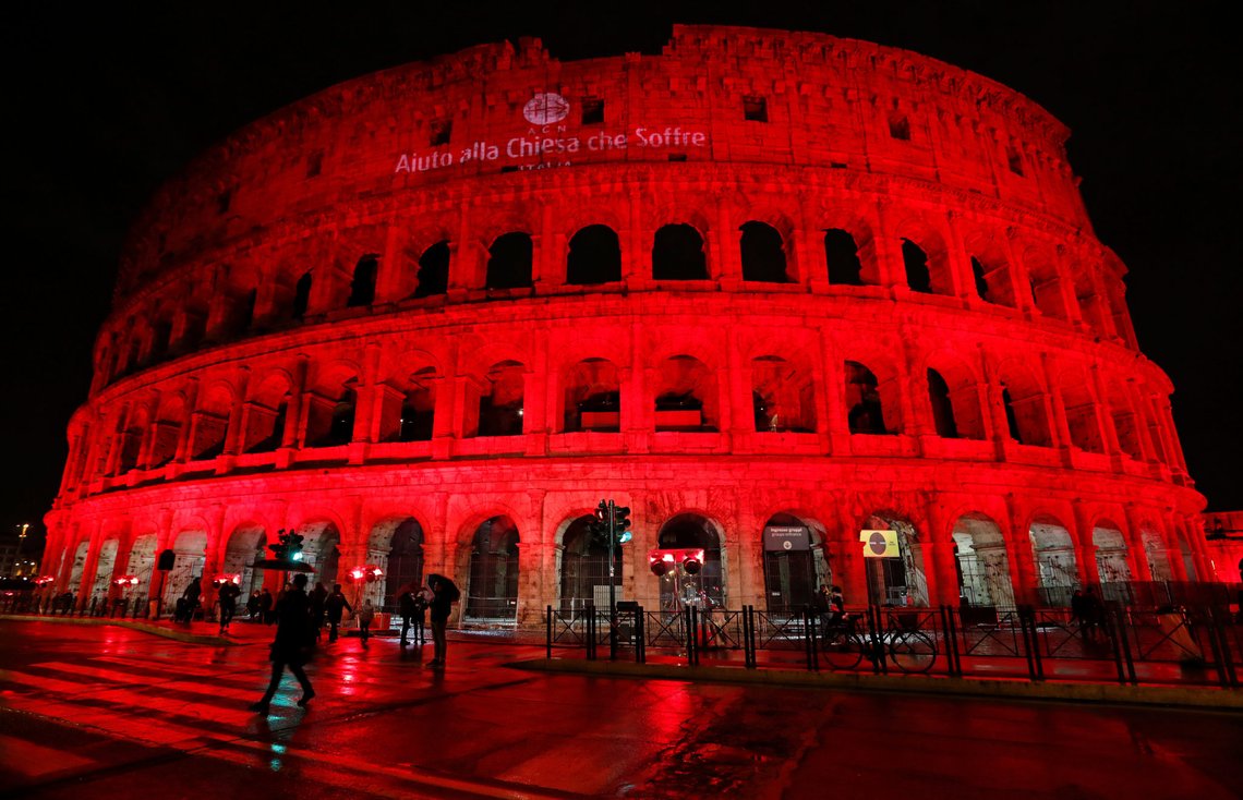 The Colosseum is lit up in red to draw attention to the persecution of Christians around the world in Rome, Italy, February 24, 2018. REUTERS/Remo Casilli The Colosseum is lit up in red to draw attention to the persecution of Christians around the world in Rome, Italy, February 24, 2018. REUTERS/Remo Casilli