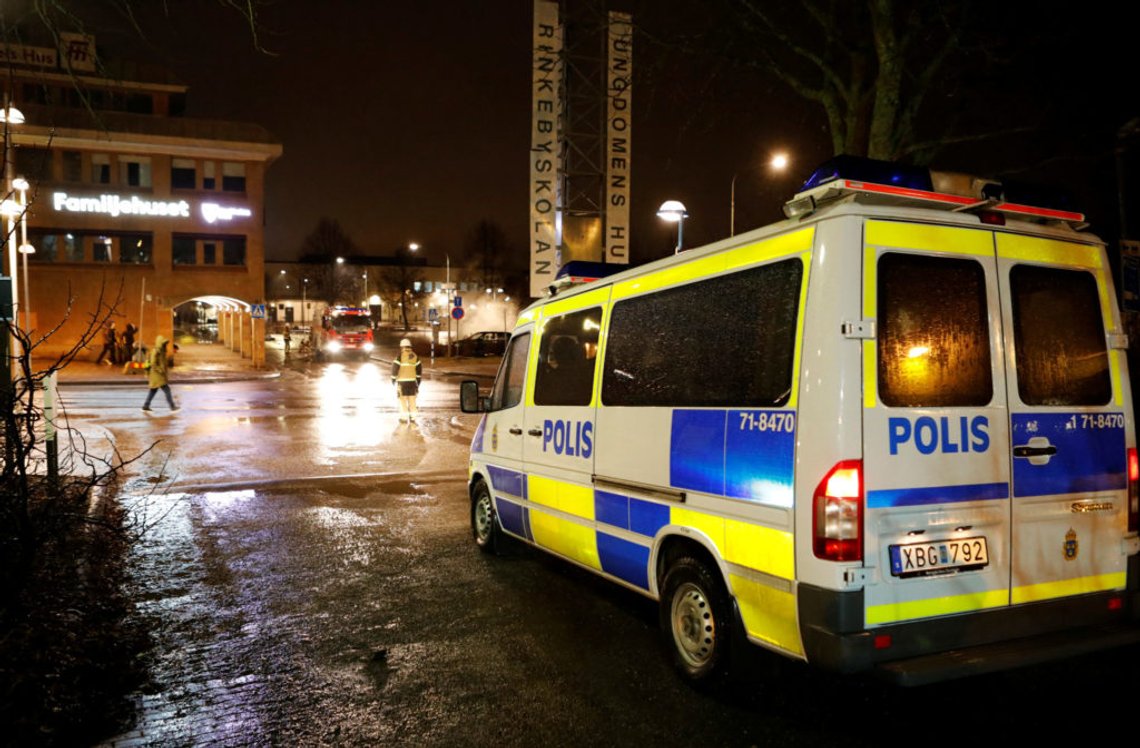 A police car is seen as several cars were set on fire during a riot, according to local media, in Rinkeby suburb, outside Stockholm, Sweden February 20, 2017. Picture taken February 20, 2017. TT News Agency/Christine Olsson/via REUTERS ATTENTION EDITORS - THIS IMAGE WAS PROVIDED BY A THIRD PARTY. FOR EDITORIAL USE ONLY. SWEDEN OUT. NO COMMERCIAL OR EDITORIAL SALES IN SWEDEN. A police car is seen as several cars were set on fire during a riot, according to local media, in Rinkeby suburb, outside Stockholm, Sweden February 20, 2017. Picture taken February 20, 2017. TT News Agency/Christine Olsson/via REUTERS ATTENTION EDITORS - THIS IMAGE WAS PROVIDED BY A THIRD PARTY. FOR EDITORIAL USE ONLY. SWEDEN OUT. NO COMMERCIAL OR EDITORIAL SALES IN SWEDEN.