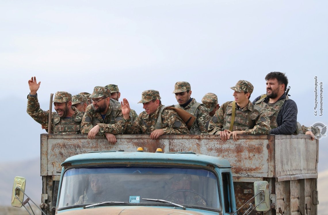 Ethnic Armenian soldiers are seen in a vehicle during fighting with Azerbaijan's forces in the breakaway region of Nagorno-Karabakh, in this handout picture released September 29, 2020. Defence Ministry of Armenia/Handout via REUTERS ATTENTION EDITORS - THIS IMAGE HAS BEEN SUPPLIED BY A THIRD PARTY. NO RESALES. NO ARCHIVES. MANDATORY CREDIT. PICTURE WATERMARKED AT SOURCE. Ethnic Armenian soldiers are seen in a vehicle during fighting with Azerbaijan's forces in the breakaway region of Nagorno-Karabakh, in this handout picture released September 29, 2020. Defence Ministry of Armenia/Handout via REUTERS ATTENTION EDITORS - THIS IMAGE HAS BEEN SUPPLIED BY A THIRD PARTY. NO RESALES. NO ARCHIVES. MANDATORY CREDIT. PICTURE WATERMARKED AT SOURCE.