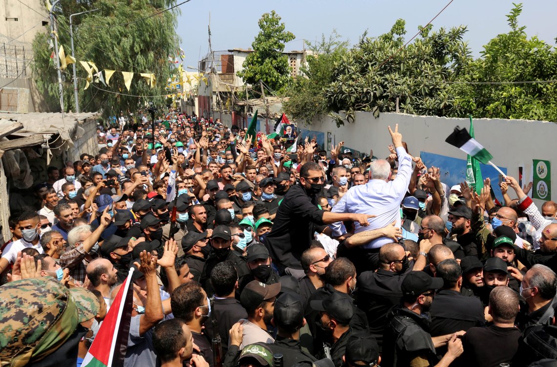 Palestinian group Hamas' top leader, Ismail Haniyeh, gestures as he is carried during his visit at Ain el Hilweh Palestinian refugee camp in Sidon, Lebanon September 6, 2020. REUTERS/Aziz Taher Palestinian group Hamas' top leader, Ismail Haniyeh, gestures as he is carried during his visit at Ain el Hilweh Palestinian refugee camp in Sidon, Lebanon September 6, 2020. REUTERS/Aziz Taher