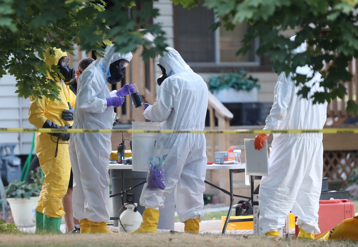 FBI and law enforcement officers in hazmat suites prepare to enter a house, which FBI says was investigating "potentially hazardous chemicals" in Logan, Utah, U.S., October 3, 2018. REUTERS/George Frey TPX IMAGES OF THE DAY FBI and law enforcement officers in hazmat suites prepare to enter a house, which FBI says was investigating "potentially hazardous chemicals" in Logan, Utah, U.S., October 3, 2018. REUTERS/George Frey TPX IMAGES OF THE DAY