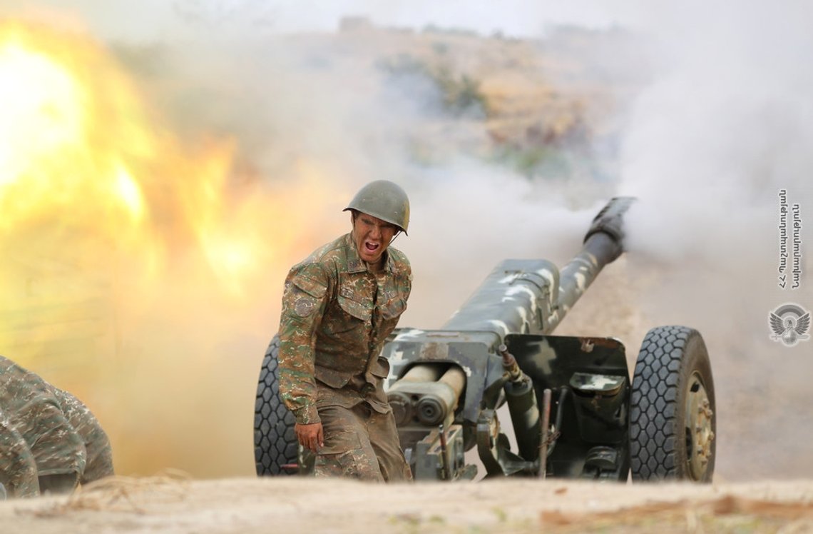 An ethnic Armenian soldier fires an artillery piece during fighting with Azerbaijan's forces in the breakaway region of Nagorno-Karabakh, in this handout picture released September 29, 2020. Defence Ministry of Armenia/Handout via REUTERS ATTENTION EDITORS - THIS IMAGE HAS BEEN SUPPLIED BY A THIRD PARTY. NO RESALES. NO ARCHIVES. MANDATORY CREDIT. PICTURE WATERMARKED AT SOURCE. An ethnic Armenian soldier fires an artillery piece during fighting with Azerbaijan's forces in the breakaway region of Nagorno-Karabakh, in this handout picture released September 29, 2020. Defence Ministry of Armenia/Handout via REUTERS ATTENTION EDITORS - THIS IMAGE HAS BEEN SUPPLIED BY A THIRD PARTY. NO RESALES. NO ARCHIVES. MANDATORY CREDIT. PICTURE WATERMARKED AT SOURCE.