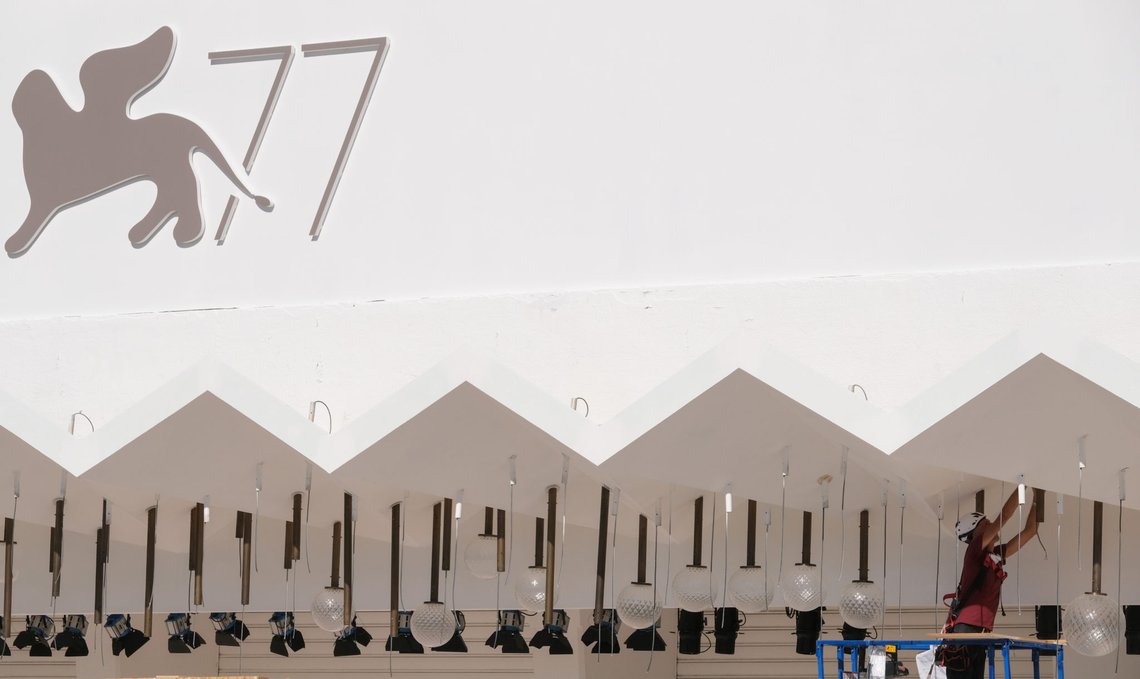 The logo of the 77th Venice Film Festival is seen as worker prepares for the first post lockdown film festival which opens in just over a week, with the coronavirus disease (COVID-19) precautions being top of the list, at the Lido in Venice, Italy, August 25, 2020. REUTERS/Manuel Silvestri The logo of the 77th Venice Film Festival is seen as worker prepares for the first post lockdown film festival which opens in just over a week, with the coronavirus disease (COVID-19) precautions being top of the list, at the Lido in Venice, Italy, August 25, 2020. REUTERS/Manuel Silvestri