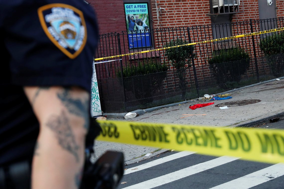 A blood stained sidewalk and clothing are seen behind NYPD police tape, where according to local media reports five people were shot, including a 6-year-old boy, early Monday during an outdoor J’Ouvert celebration, in the Crown Heights section Brooklyn in New York, U.S., September 7, 2020. REUTERS/Shannon Stapleton A blood stained sidewalk and clothing are seen behind NYPD police tape, where according to local media reports five people were shot, including a 6-year-old boy, early Monday during an outdoor J’Ouvert celebration, in the Crown Heights section Brooklyn in New York, U.S., September 7, 2020. REUTERS/Shannon Stapleton