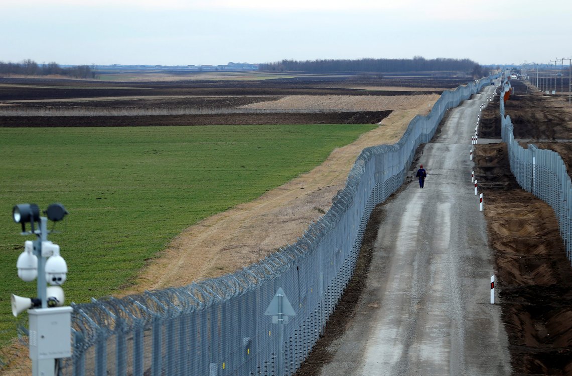 A Hungarian police van patrols the Hungary-Serbia border, which was recently fortified by a second fence, near the village of Gara, Hungary March 2, 2017. REUTERS/Laszlo Balogh A Hungarian police van patrols the Hungary-Serbia border, which was recently fortified by a second fence, near the village of Gara, Hungary March 2, 2017. REUTERS/Laszlo Balogh