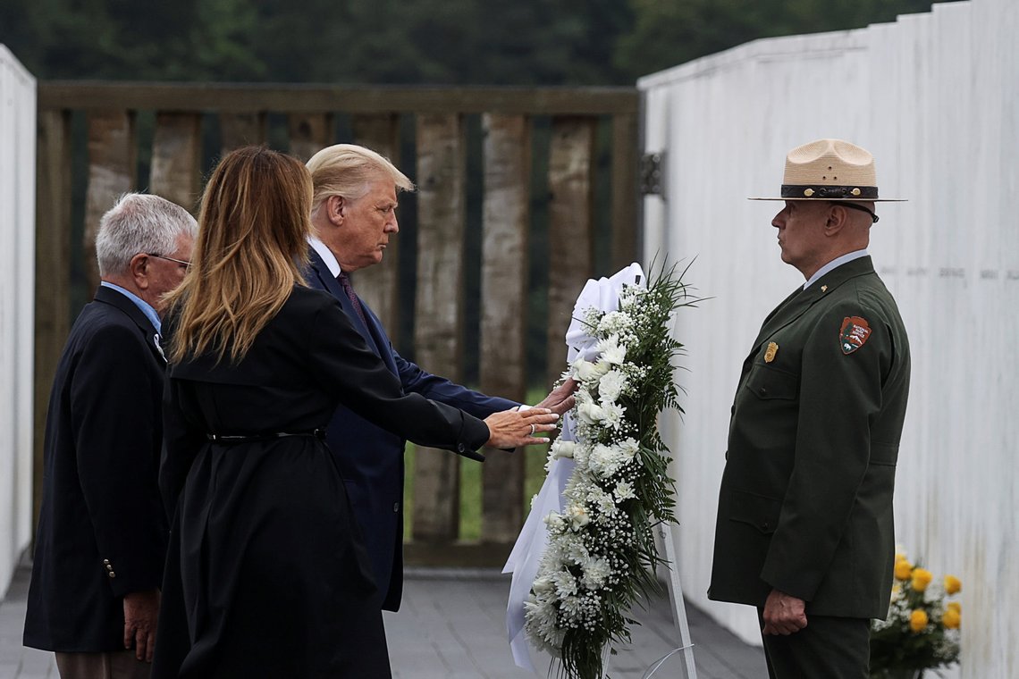 U.S. President Donald Trump and first lady Melania Trump place a wreath during a ceremony at the Flight 93 National Memorial, remembering those killed when hijacked Flight 93 crashed into an open field on September 11, 2001, in Stoystown, Pennsylvania, September 11, 2020. REUTERS/Jonathan Ernst U.S. President Donald Trump and first lady Melania Trump place a wreath during a ceremony at the Flight 93 National Memorial, remembering those killed when hijacked Flight 93 crashed into an open field on September 11, 2001, in Stoystown, Pennsylvania, September 11, 2020. REUTERS/Jonathan Ernst