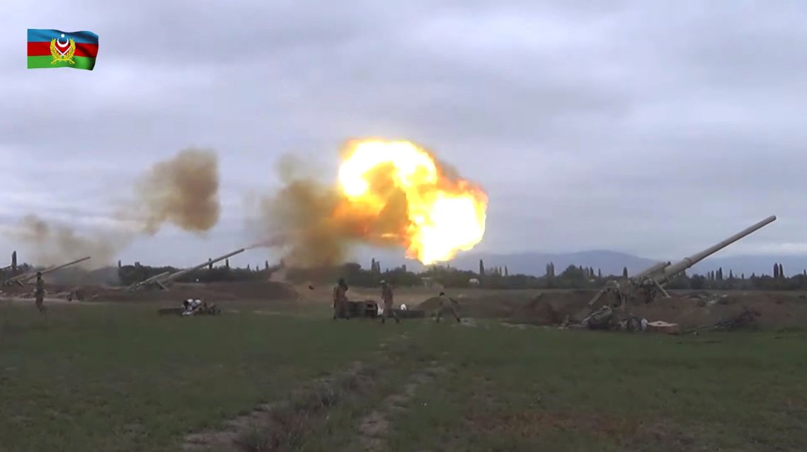 A still image from a video released by the Azerbaijan's Defence Ministry shows members of Azeri armed forces firing artillery during clashes between Armenia and Azerbaijan over the territory of Nagorno-Karabakh in an unidentified location, in this still image from footage released September 28, 2020. Defence Ministry of Azerbaijan/Handout via REUTERS ATTENTION EDITORS - THIS IMAGE HAS BEEN SUPPLIED BY A THIRD PARTY. NO RESALES. NO ARCHIVES. MANDATORY CREDIT. A still image from a video released by the Azerbaijan's Defence Ministry shows members of Azeri armed forces firing artillery during clashes between Armenia and Azerbaijan over the territory of Nagorno-Karabakh in an unidentified location, in this still image from footage released September 28, 2020. Defence Ministry of Azerbaijan/Handout via REUTERS ATTENTION EDITORS - THIS IMAGE HAS BEEN SUPPLIED BY A THIRD PARTY. NO RESALES. NO ARCHIVES. MANDATORY CREDIT.