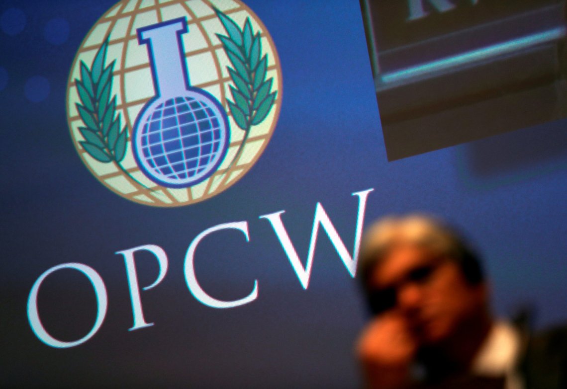 FILE PHOTO: The logo of the Organisation for the Prohibition of Chemical Weapons (OPCW) is seen during a special session in the Hague, Netherlands June 26, 2018. REUTERS/Yves Herman/File Photo FILE PHOTO: The logo of the Organisation for the Prohibition of Chemical Weapons (OPCW) is seen during a special session in the Hague, Netherlands June 26, 2018. REUTERS/Yves Herman/File Photo