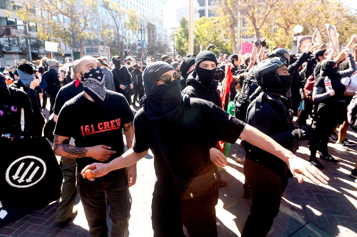 A counter-protester throws an egg at conservative activists staging a free speech rally in San Francisco on Saturday, Oct. 17, 2020. About a dozen pro-Trump demonstrators were met by several hundred counter-protesters as they tried to rally. (AP Photo/Noah Berger) A counter-protester throws an egg at conservative activists staging a free speech rally in San Francisco on Saturday, Oct. 17, 2020. About a dozen pro-Trump demonstrators were met by several hundred counter-protesters as they tried to rally. (AP Photo/Noah Berger)
