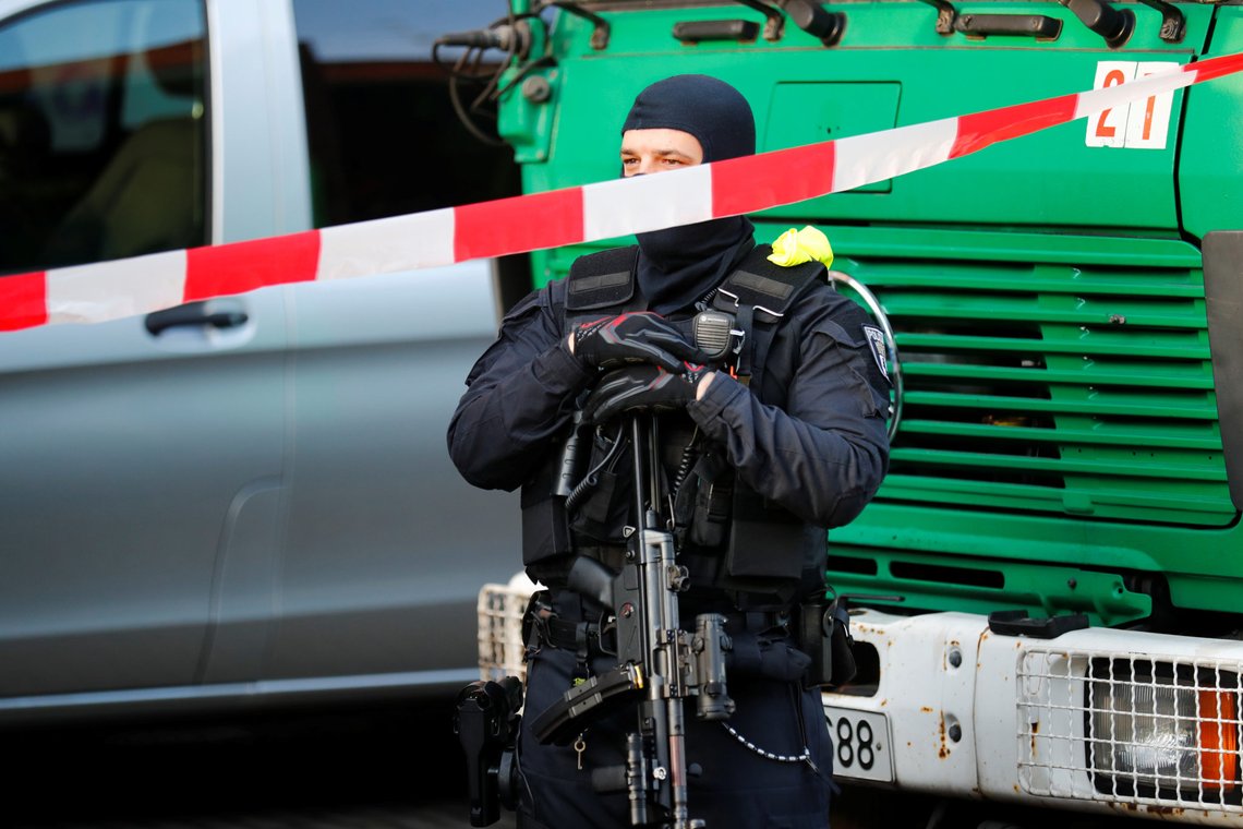 German special police guards the entrance of the El-Irschad (Al-Iraschad e.V.) centre in Berlin, Germany, April 30, 2020, after Germany has banned Iran-backed Hezbollah on its soil and designated it a terrorist organisation. REUTERS/Hannibal Hanschke German special police guards the entrance of the El-Irschad (Al-Iraschad e.V.) centre in Berlin, Germany, April 30, 2020, after Germany has banned Iran-backed Hezbollah on its soil and designated it a terrorist organisation. REUTERS/Hannibal Hanschke