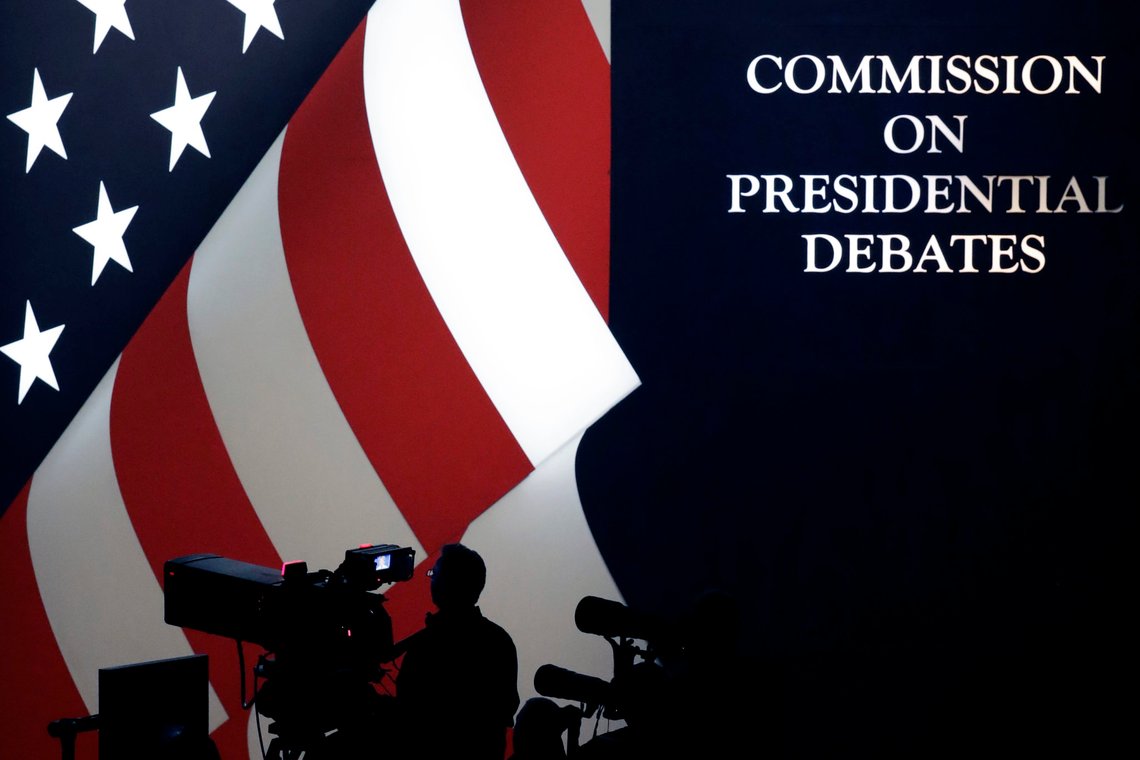FILE - In this Oct. 19, 2016 file photo, the set is shown during the third presidential debate at UNLV in Las Vegas. The nonpartisan commission that sponsors presidential debates says a 2020 Presidential debate that had been scheduled to be held in Michigan will now take place in Florida. The Commission on Presidential Debates announced Tuesday that Adrienne Arsht Center for the Performing Arts of Miami-Dade County in Miami will host the debate originally set for the University of Michigan, Ann Arbor. The commission says the university concluded it is no longer feasible to host the debate. (AP Photo/Julio Cortez) FILE - In this Oct. 19, 2016 file photo, the set is shown during the third presidential debate at UNLV in Las Vegas. The nonpartisan commission that sponsors presidential debates says a 2020 Presidential debate that had been scheduled to be held in Michigan will now take place in Florida. The Commission on Presidential Debates announced Tuesday that Adrienne Arsht Center for the Performing Arts of Miami-Dade County in Miami will host the debate originally set for the University of Michigan, Ann Arbor. The commission says the university concluded it is no longer feasible to host the debate. (AP Photo/Julio Cortez)