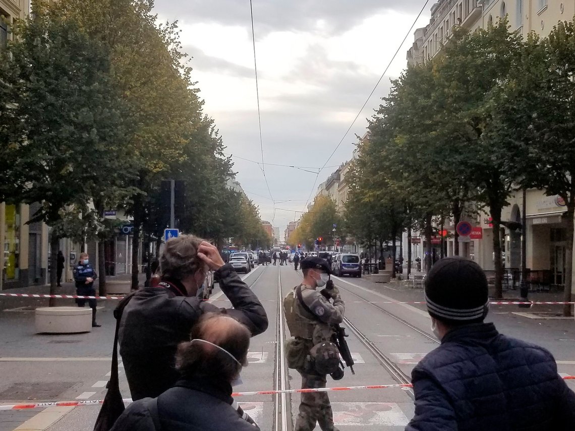In this photo provided by Tom Vannier, police are at the scene of an attack in Nice, France, Thursday, Oct. 29, 2020. An attacker armed with a knife killed three people at a church in the Mediterranean city of Nice, the third attack in two months in France. The assailant was shot by police and hospitalized after the killings at the Notre Dame Church on Thursday. (Tom Vannier via AP) In this photo provided by Tom Vannier, police are at the scene of an attack in Nice, France, Thursday, Oct. 29, 2020. An attacker armed with a knife killed three people at a church in the Mediterranean city of Nice, the third attack in two months in France. The assailant was shot by police and hospitalized after the killings at the Notre Dame Church on Thursday. (Tom Vannier via AP)