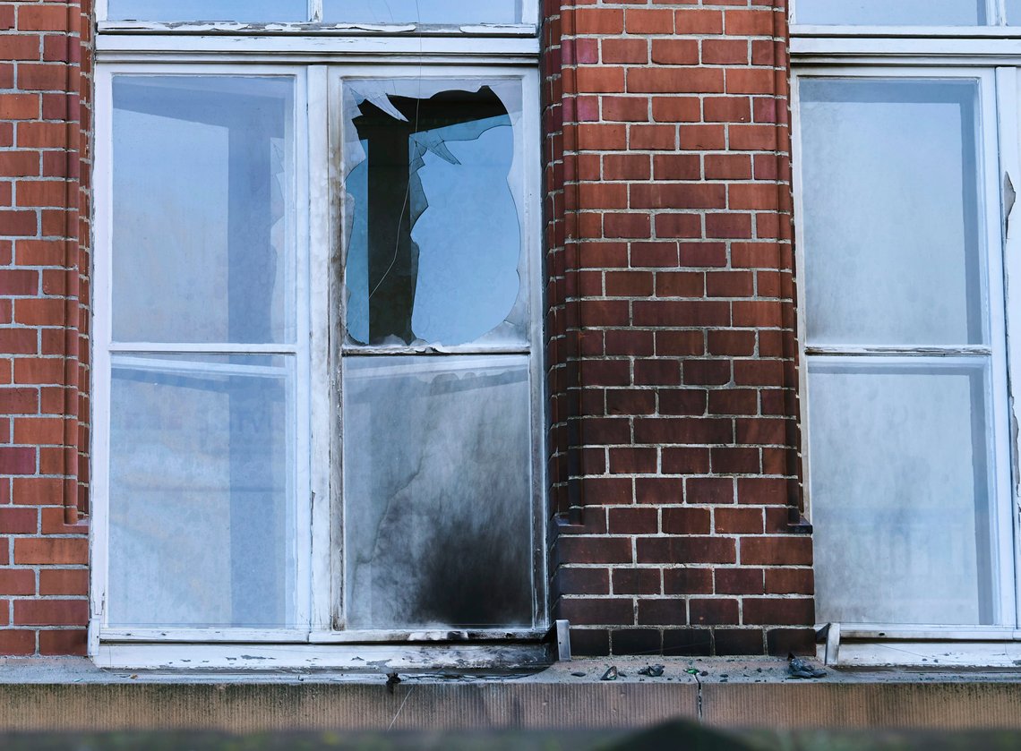 The fassade and windows of the Robert Koch Institute in General-Pape-Strasse are damaged in Berlin, Germany, Sunday, Oct.25, 2020. Incendiary bombs left soot marks. According to police, bottles and incendiary devices were thrown at the building during the night of Sunday, October 25, 2020. (Annette Riedl/dpa via AP) The fassade and windows of the Robert Koch Institute in General-Pape-Strasse are damaged in Berlin, Germany, Sunday, Oct.25, 2020. Incendiary bombs left soot marks. According to police, bottles and incendiary devices were thrown at the building during the night of Sunday, October 25, 2020. (Annette Riedl/dpa via AP)