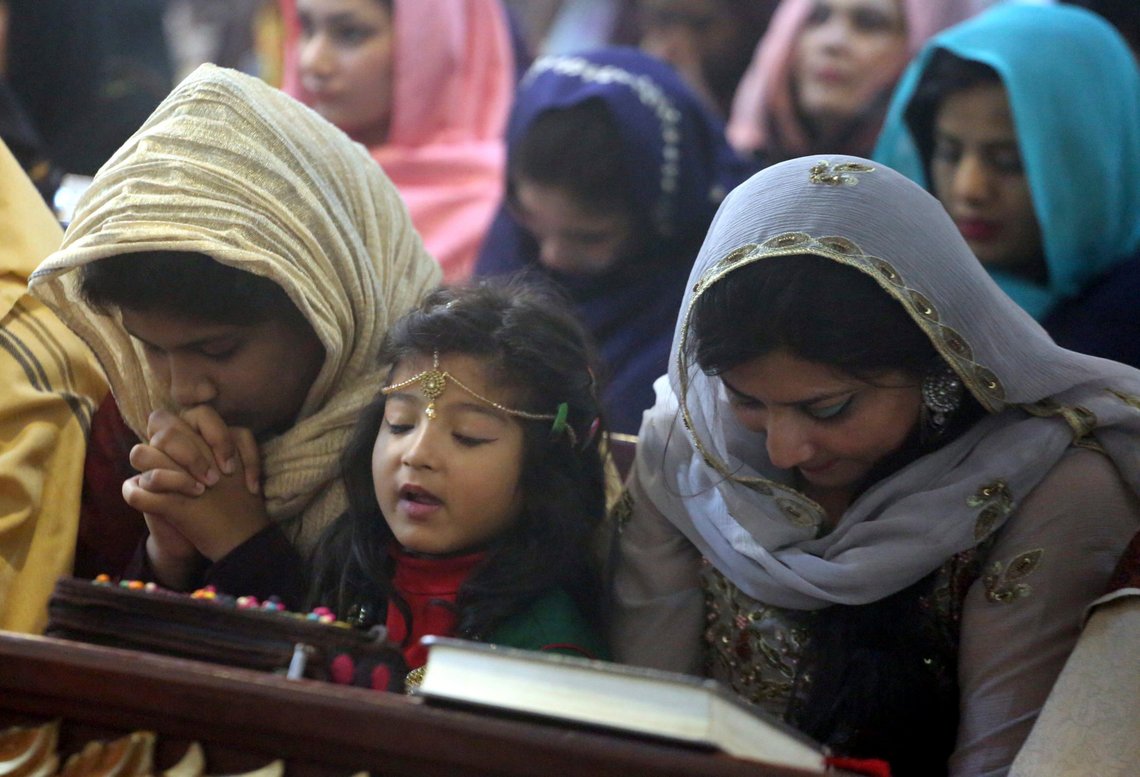 Pakistan Christians attend Christmas Mass at a church in Peshawar, Pakistan, Wednesday, Dec. 25, 2019. (AP Photo/Muhammad Sajjad) Pakistan Christians attend Christmas Mass at a church in Peshawar, Pakistan, Wednesday, Dec. 25, 2019. (AP Photo/Muhammad Sajjad)