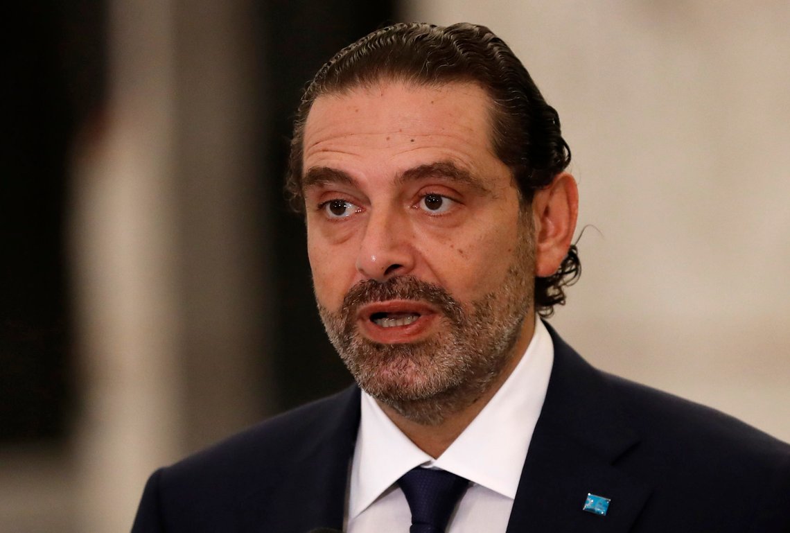 Lebanese Prime Minister-Designate Saad Hariri speaks to journalists at the Presidential Palace in Baabda, east of Beirut, Lebanon, Thursday, Oct, 22, 2020. Lebanon's president Michel Aoun asked former premier Saad Hariri to form the country's next government Thursday after he secured enough votes from lawmakers - bringing back an old name to lead the country out of its dire political and economic crises. (AP Photo/Hussein Malla) Lebanese Prime Minister-Designate Saad Hariri speaks to journalists at the Presidential Palace in Baabda, east of Beirut, Lebanon, Thursday, Oct, 22, 2020. Lebanon's president Michel Aoun asked former premier Saad Hariri to form the country's next government Thursday after he secured enough votes from lawmakers - bringing back an old name to lead the country out of its dire political and economic crises. (AP Photo/Hussein Malla)