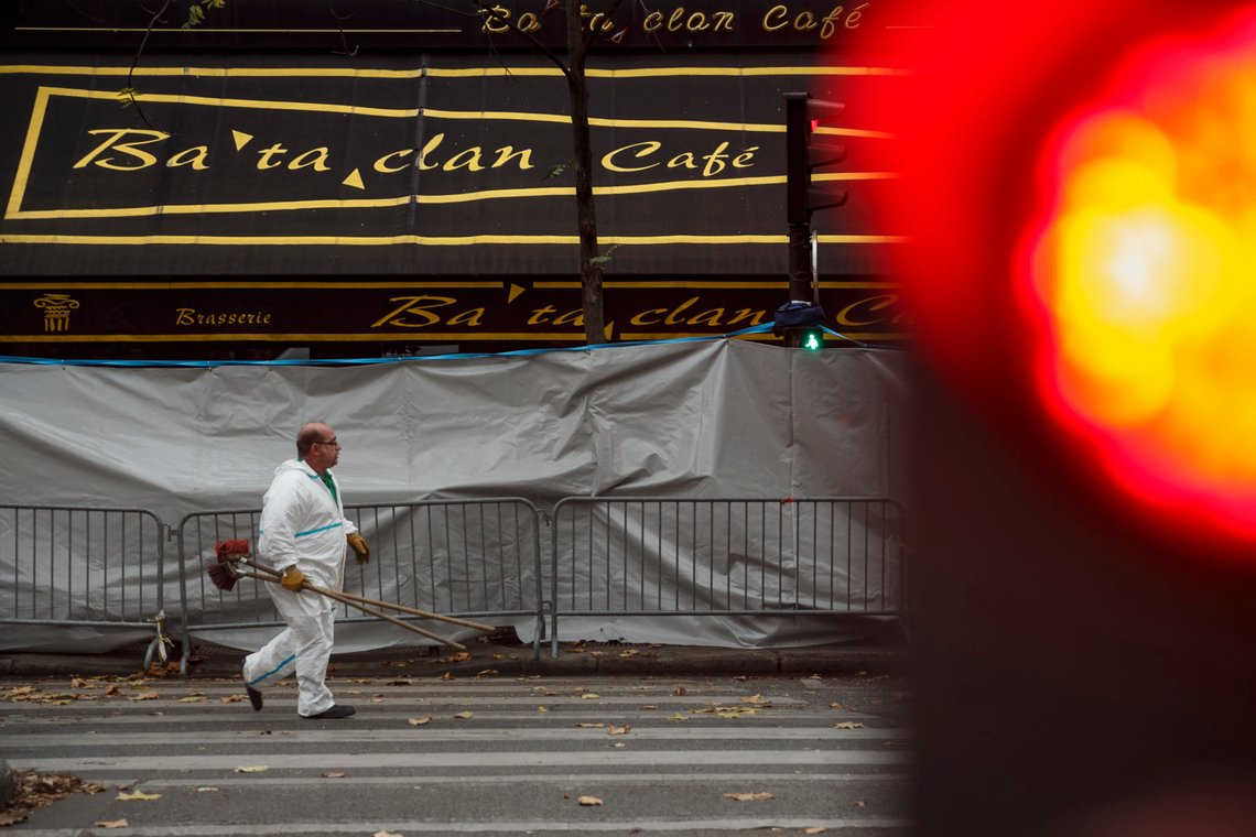A man carries brushes outside the Bataclan concert hall after the terrorist attacks in Paris, Monday, Nov. 16, 2015. France is urging its European partners to move swiftly to boost intelligence sharing, fight arms trafficking and terror financing, and strengthen border security in the wake of the Paris attacks. (AP Photo/Daniel Ochoa de Olza) A man carries brushes outside the Bataclan concert hall after the terrorist attacks in Paris, Monday, Nov. 16, 2015. France is urging its European partners to move swiftly to boost intelligence sharing, fight arms trafficking and terror financing, and strengthen border security in the wake of the Paris attacks. (AP Photo/Daniel Ochoa de Olza)