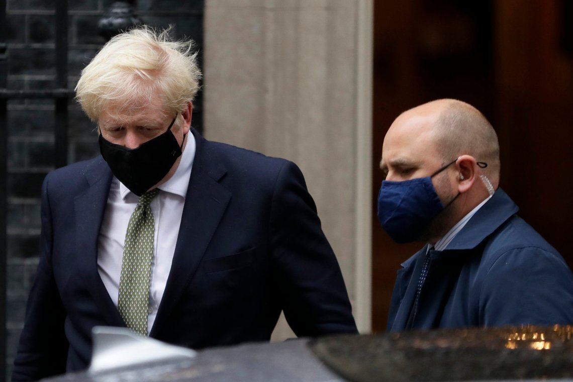 Britain's Prime Minister Boris Johnson leaves Downing Street to attend parliament in London, Monday, Oct. 12, 2020. British Prime Minister Boris Johnson is expected to announce in Parliament on Monday a three-tier local lockdown system, formally known as "Local COVID Alert Levels," for England, his office said. (AP Photo/Kirsty Wigglesworth) Britain's Prime Minister Boris Johnson leaves Downing Street to attend parliament in London, Monday, Oct. 12, 2020. British Prime Minister Boris Johnson is expected to announce in Parliament on Monday a three-tier local lockdown system, formally known as "Local COVID Alert Levels," for England, his office said. (AP Photo/Kirsty Wigglesworth)