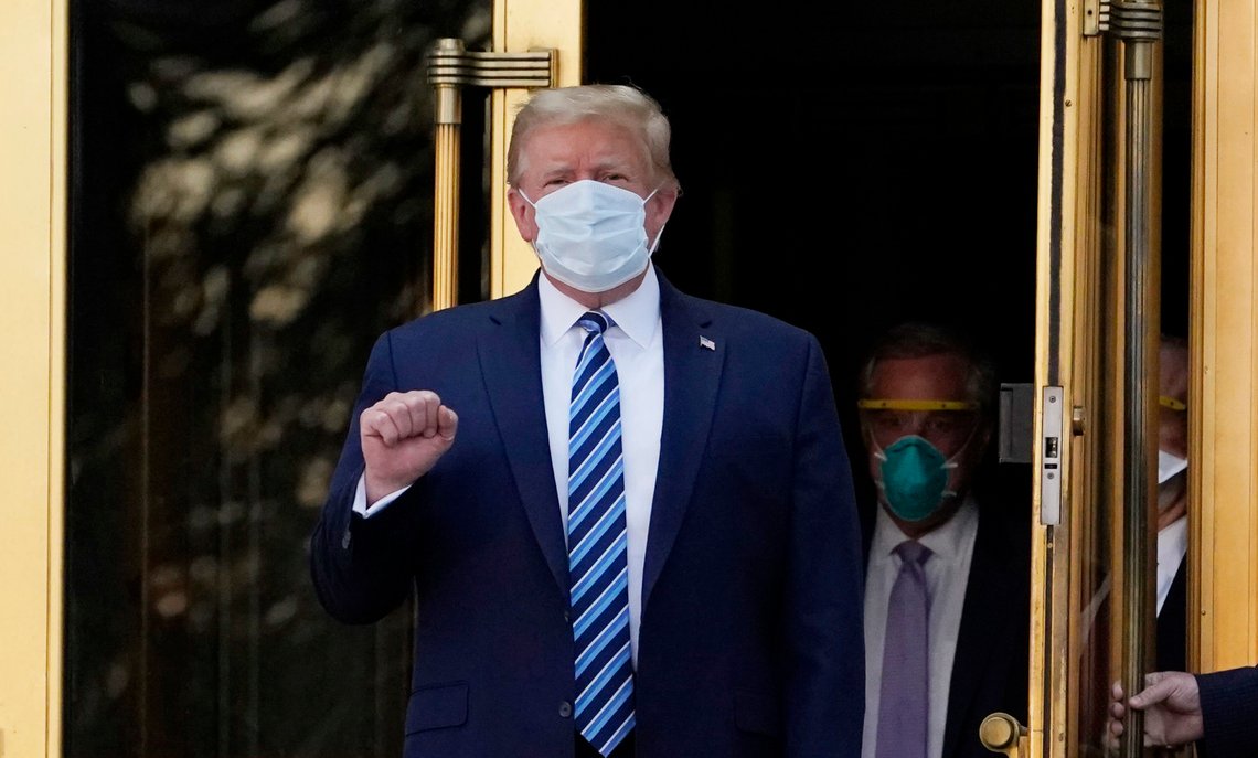 President Donald Trump walks out of Walter Reed National Military Medical Center to return to the White House after receiving treatments for covid-19, Monday, Oct. 5, 2020, in Bethesda, Md. (AP Photo/Evan Vucci) President Donald Trump walks out of Walter Reed National Military Medical Center to return to the White House after receiving treatments for covid-19, Monday, Oct. 5, 2020, in Bethesda, Md. (AP Photo/Evan Vucci)