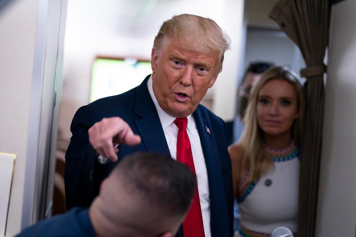 President Donald Trump talks with reporters after leaving a campaign rally at Pensacola International Airport, Friday, Oct. 23, 2020, aboard Air Force One. (AP Photo/Evan Vucci) President Donald Trump talks with reporters after leaving a campaign rally at Pensacola International Airport, Friday, Oct. 23, 2020, aboard Air Force One. (AP Photo/Evan Vucci)
