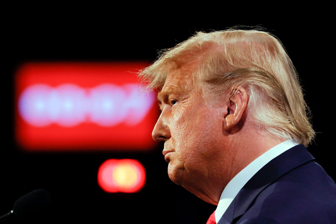 President Donald Trump listens during the second and final presidential debate Thursday, Oct. 22, 2020, at Belmont University in Nashville, Tenn., with Democratic presidential candidate former Vice President Joe Biden. (Jim Bourg/Pool via AP) President Donald Trump listens during the second and final presidential debate Thursday, Oct. 22, 2020, at Belmont University in Nashville, Tenn., with Democratic presidential candidate former Vice President Joe Biden. (Jim Bourg/Pool via AP)