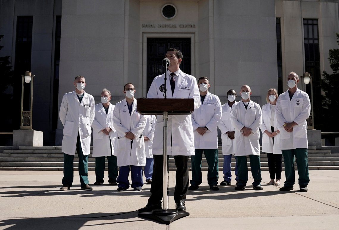 U.S. Navy Commander Dr. Sean Conley, the White House physician, talks to the media about U.S. President Donald Trump's health after the president was hospitalized for coronavirus disease (COVID-19) treatment, at Walter Reed National Military Medical Center, in Bethesda, Maryland, U.S., October 3, 2020. REUTERS/Ken Cedeno U.S. Navy Commander Dr. Sean Conley, the White House physician, talks to the media about U.S. President Donald Trump's health after the president was hospitalized for coronavirus disease (COVID-19) treatment, at Walter Reed National Military Medical Center, in Bethesda, Maryland, U.S., October 3, 2020. REUTERS/Ken Cedeno