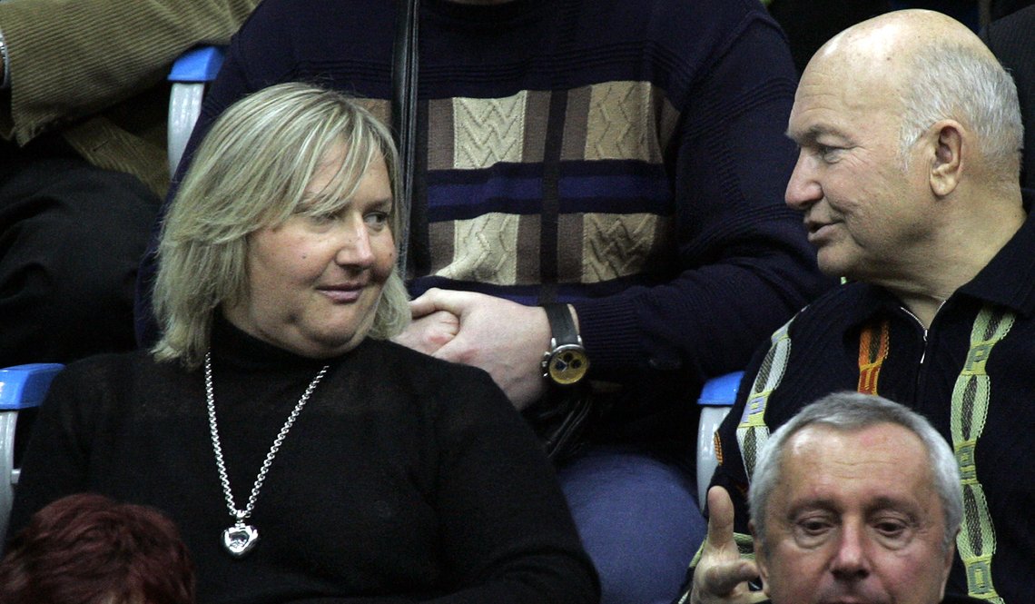 Moscow mayor Yuri Luzhkov, right, speaks to his billionaire wife Yelena Baturina, left, during the Davis Cup Final tennis match between Russia's Nikolay Davydenko and Aregntina's David Nalbandian in Moscow, Sunday, Dec. 3, 2006. (AP Photo/Ivan Sekretarev) Moscow mayor Yuri Luzhkov, right, speaks to his billionaire wife Yelena Baturina, left, during the Davis Cup Final tennis match between Russia's Nikolay Davydenko and Aregntina's David Nalbandian in Moscow, Sunday, Dec. 3, 2006. (AP Photo/Ivan Sekretarev)
