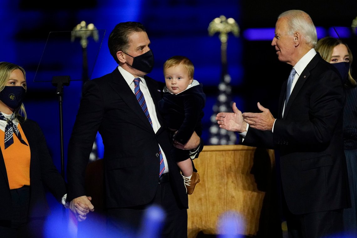 President-elect Joe Biden greets his son Hunter Biden and wife Melissa Cohen, left, as he holds his son, as he stands on stage with his family Saturday, Nov. 7, 2020, in Wilmington, Del. (AP Photo/Andrew Harnik) President-elect Joe Biden greets his son Hunter Biden and wife Melissa Cohen, left, as he holds his son, as he stands on stage with his family Saturday, Nov. 7, 2020, in Wilmington, Del. (AP Photo/Andrew Harnik)