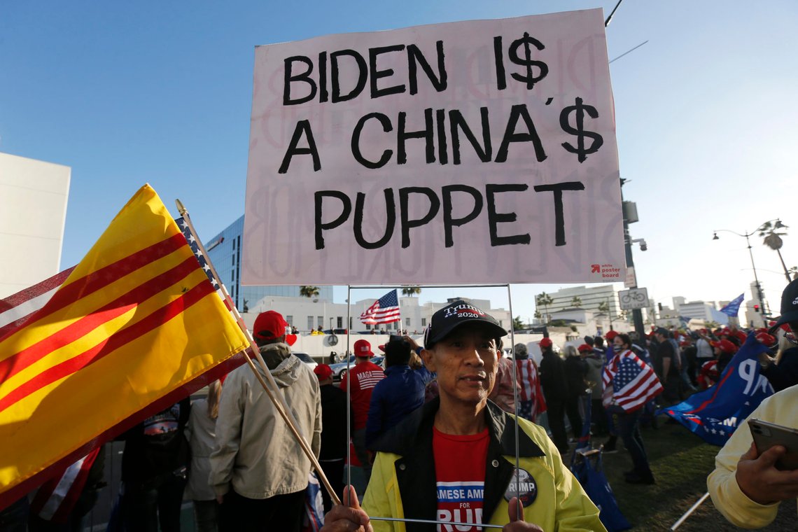 Supporters of President Donald Trump rally in Beverly Hills, Calif., Saturday, Nov. 7, 2020. Democrat Joe Biden defeated President Donald Trump to become the 46th president of the United States on Saturday, positioning himself to lead a nation gripped by the historic pandemic and a confluence of economic and social turmoil. (AP Photo/Ringo H.W. Chiu) Supporters of President Donald Trump rally in Beverly Hills, Calif., Saturday, Nov. 7, 2020. Democrat Joe Biden defeated President Donald Trump to become the 46th president of the United States on Saturday, positioning himself to lead a nation gripped by the historic pandemic and a confluence of economic and social turmoil. (AP Photo/Ringo H.W. Chiu)