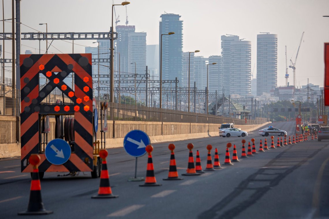 A police roadblock is seen on a highway on the first day of the three-week nationwide lockdown, in Tel Aviv, Israel, Friday, Sept 18, 2020. Israel went back into a full lockdown on Friday to try to contain a coronavirus outbreak that has steadily worsened for months as its government has been plagued by indecision and infighting. (AP Photo/Oded Balilty) A police roadblock is seen on a highway on the first day of the three-week nationwide lockdown, in Tel Aviv, Israel, Friday, Sept 18, 2020. Israel went back into a full lockdown on Friday to try to contain a coronavirus outbreak that has steadily worsened for months as its government has been plagued by indecision and infighting. (AP Photo/Oded Balilty)