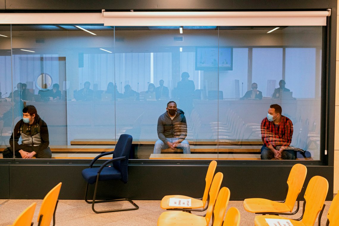 Mohamed Houli Chemlal, left, Driss Oukabir, centre and and Said Ben Iazza, right sit behind a glass panel inside the national court at the start of a trial in San Fernando de Henares on the outskirts of Madrid, Spain, Tuesday Nov. 10, 2020. The men went on trial Tuesday for their alleged roles in terror attacks in and near Barcelona that killed 16 people and injured some 140 in 2017. The three, Driss Oukabir, Mohamed Houli Chemlal and Said Ben Iazza, are not accused of taking part directly in the attacks but of forming part of the extremist cell that carried them out. (Fernando Villar, Pool photo via AP) Mohamed Houli Chemlal, left, Driss Oukabir, centre and and Said Ben Iazza, right sit behind a glass panel inside the national court at the start of a trial in San Fernando de Henares on the outskirts of Madrid, Spain, Tuesday Nov. 10, 2020. The men went on trial Tuesday for their alleged roles in terror attacks in and near Barcelona that killed 16 people and injured some 140 in 2017. The three, Driss Oukabir, Mohamed Houli Chemlal and Said Ben Iazza, are not accused of taking part directly in the attacks but of forming part of the extremist cell that carried them out. (Fernando Villar, Pool photo via AP)