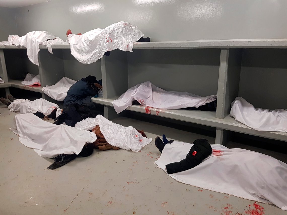 Bodies of people killed in a explosion lie in a hospital morgue in Bamyan province, northwest of Kabul, Afghanistan, Tuesday, Nov. 24, 2020. An Afghan official says a roadside bomb has exploded in central Afghanistan, killing and injuring tens of people. The attack Tuesday comes as government negotiators and the Taliban meet to find an end to decades of war. (AP Photo) Bodies of people killed in a explosion lie in a hospital morgue in Bamyan province, northwest of Kabul, Afghanistan, Tuesday, Nov. 24, 2020. An Afghan official says a roadside bomb has exploded in central Afghanistan, killing and injuring tens of people. The attack Tuesday comes as government negotiators and the Taliban meet to find an end to decades of war. (AP Photo)