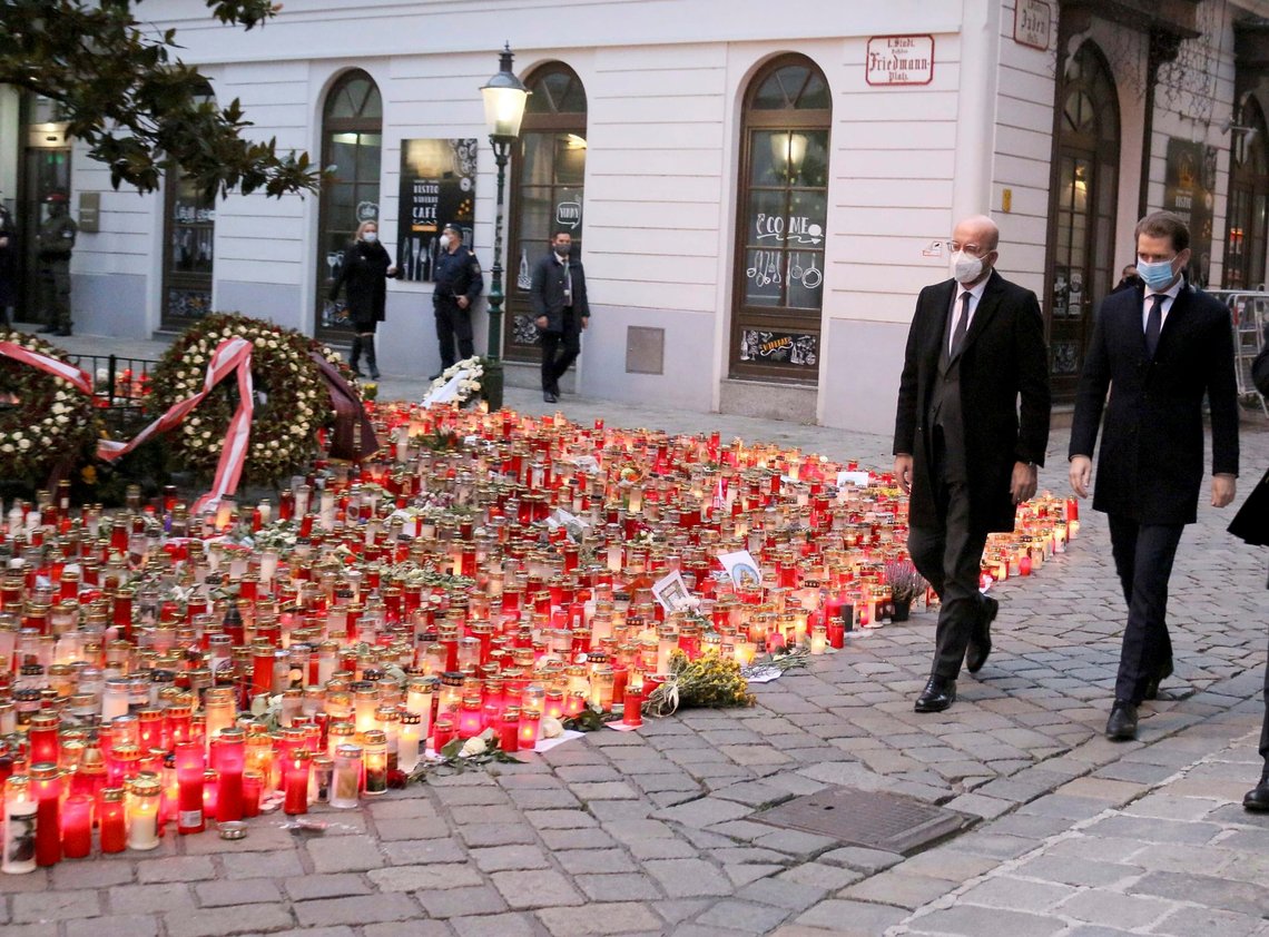 President of the European Council Charles Michel with Austrian Chancellor Sebastian Kurz, right, walk past tributes to those killed, as they commemorate the terror attack one week ago in Vienna, Austria, Monday, Nov. 9, 2020. Several shots were fired shortly after 8 p.m. local time on Monday, Nov. 2, in a lively street in the city center of Vienna. (AP Photo/Ronald Zak) President of the European Council Charles Michel with Austrian Chancellor Sebastian Kurz, right, walk past tributes to those killed, as they commemorate the terror attack one week ago in Vienna, Austria, Monday, Nov. 9, 2020. Several shots were fired shortly after 8 p.m. local time on Monday, Nov. 2, in a lively street in the city center of Vienna. (AP Photo/Ronald Zak)