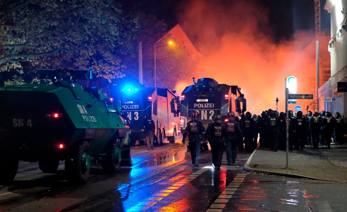 Police with water cannons march into riots in the Connewitz district, Saturday, Nov. 7, 2020, in Leipzig, Germany. Several thousand people took part in the rally against the corona measures adopted by the federal and state governments. (Sebastian Willnow/dpa-Zentralbild via AP) Police with water cannons march into riots in the Connewitz district, Saturday, Nov. 7, 2020, in Leipzig, Germany. Several thousand people took part in the rally against the corona measures adopted by the federal and state governments. (Sebastian Willnow/dpa-Zentralbild via AP)