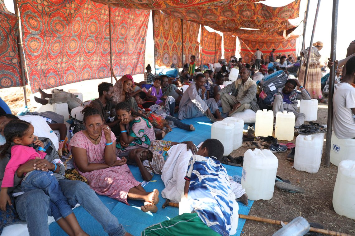 Ethiopian refugees rest in Qadarif region, easter Sudan, Wednesday, Nov 18, 2020. The U.N. refugee agency says Ethiopia's growing conflict has resulted in thousands fleeing from the Tigray region into Sudan as fighting spilled beyond Ethiopia's borders and threatened to inflame the Horn of Africa region. (AP Photo/Marwan Ali) Ethiopian refugees rest in Qadarif region, easter Sudan, Wednesday, Nov 18, 2020. The U.N. refugee agency says Ethiopia's growing conflict has resulted in thousands fleeing from the Tigray region into Sudan as fighting spilled beyond Ethiopia's borders and threatened to inflame the Horn of Africa region. (AP Photo/Marwan Ali)