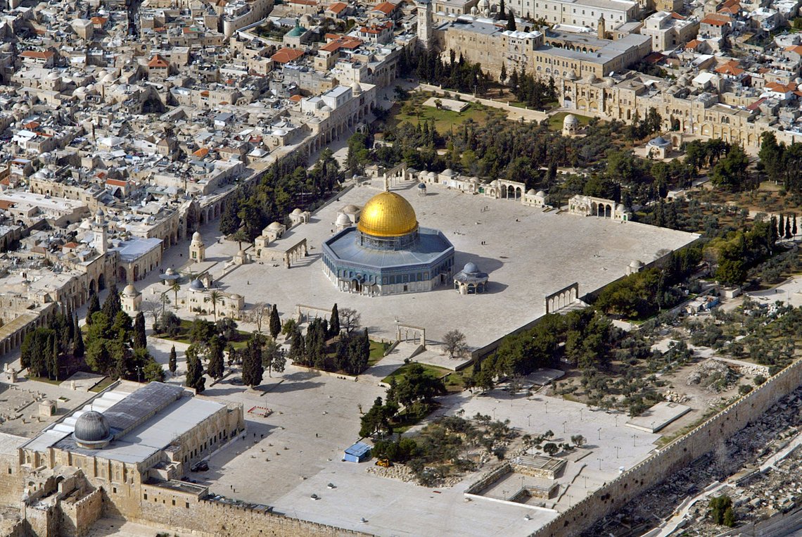 ** FILE ** An aerial view of the golden Dome of the Rock Mosque, center, and the Al Aqsa Mosgue, bottom left, at the Al Aqsa Mosque compound in east Jerusalem's Old City is seen in this Tuesday Feb. 17, 2004 file photo. The compound, known to Muslims as Haram as-Sharif, or Noble Sanctuary, the third holiest shrine in Islam, and to Jews as the Temple Mount, site of their biblical temples and Judaism's most sacred shrine, is the most sensitive spot in the Israeli-Palestinian conflict. Tzachi Hanegbi, Israel's public security minister warned Saturday that Jewish extremists could attack the site, in a bid to provoke an Islamic backlash that would fan fresh violence and wreck the Israeli plan to shut down Jewish settlements in Gaza Strip and parts of the West Bank. Some fundamentalist Jews believe that destroying the mosques and rebuilding the ruined Temple will bring about the coming of the messiah. (AP Photo/Lefteris Pitarakis) ** FILE ** An aerial view of the golden Dome of the Rock Mosque, center, and the Al Aqsa Mosgue, bottom left, at the Al Aqsa Mosque compound in east Jerusalem's Old City is seen in this Tuesday Feb. 17, 2004 file photo. The compound, known to Muslims as Haram as-Sharif, or Noble Sanctuary, the third holiest shrine in Islam, and to Jews as the Temple Mount, site of their biblical temples and Judaism's most sacred shrine, is the most sensitive spot in the Israeli-Palestinian conflict. Tzachi Hanegbi, Israel's public security minister warned Saturday that Jewish extremists could attack the site, in a bid to provoke an Islamic backlash that would fan fresh violence and wreck the Israeli plan to shut down Jewish settlements in Gaza Strip and parts of the West Bank. Some fundamentalist Jews believe that destroying the mosques and rebuilding the ruined Temple will bring about the coming of the messiah. (AP Photo/Lefteris Pitarakis)