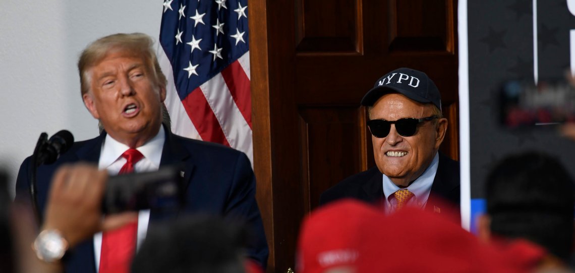 As Rudy Giuliani, an attorney for President Donald Trump, Trump speaks during an event Trump National Golf Club, Friday, Aug. 14, 2020, in Bedminster, N.J., with members of the City of New York Police Department Benevolent Association. (AP Photo/Susan Walsh) As Rudy Giuliani, an attorney for President Donald Trump, Trump speaks during an event Trump National Golf Club, Friday, Aug. 14, 2020, in Bedminster, N.J., with members of the City of New York Police Department Benevolent Association. (AP Photo/Susan Walsh)